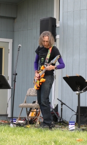 purple shirt guitarist playing at Guitar Lessons Ithaca Student Concert 2020