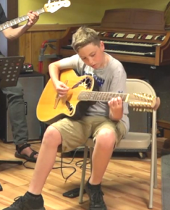Ricky, playing at Student Recital Summer 2022