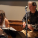 Dennis accompanying a singer