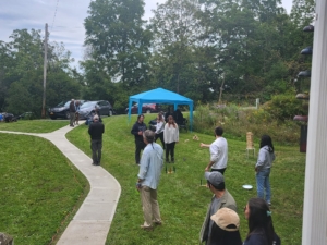 Student and family enjoying ring toss at Student party 2023