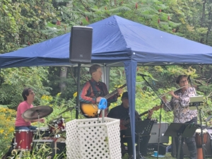 Guitar, drums and flute at Student party 2023 performing