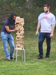 Chad and Ameen playing jenga at Student party 2023