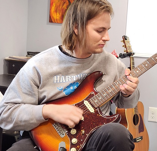 Braden Rose recording for student album